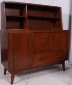 A good quality G-Plan oak sideboard stamped for Ernest Gomme having raised rack to the rear,