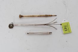 A god metal ( untested ) propelling penciltogeher with a silver swizzle stick and a hallmarked