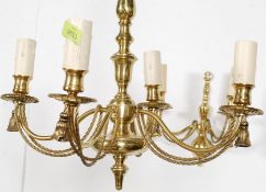 A good quality brass chandelier having modern electrical heads with fabulous rope twist design.