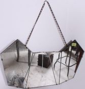 A 1930's Art Deco Triple Section Frameless bevelled edge wall mirror having unusual shape complete