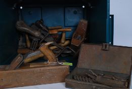 A collection of vintage 20th century tools to include woodworking planes etc