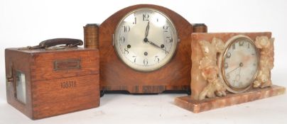 A collection of clocks to include soapstone cased mantel clock,
