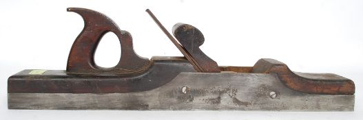 A large vintage Ibbotson box wood working plane. It has a 54cm width and a 6.