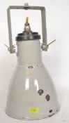 A vintage 20th century Industrial wall mounted enamel lamp of cylindrical form having pendant shade.