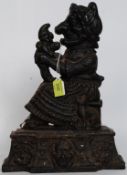 A cast iron Victorian / early 20th century doorstop in the form of  Mr. Punch.