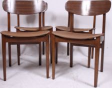 A set of 4x retro 1970's faux wood and vinyl seated dining chairs having propeller style back rests