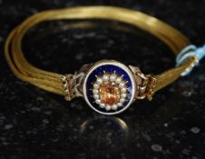 Ladies bracelet  with central oval set with enamel pearls and central citrine stone,