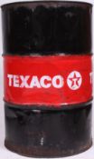 A vintage 20th century large Industrial Texaco petrol oil drum with red banded centre having TEXACO
