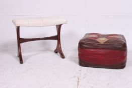 A retro leather 1960's foot pouffe of patchwork form together with a faux leather G-Plan style