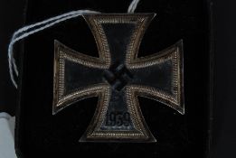 WWII Second World War Nazi Iron Cross - 1st Class 1939 the tapered pin to the reverse stamped `65`.