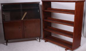 A 20th century double sided bookcase cabinet.