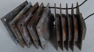 A set of 10 early 20th century copper campaign style handles for chest of drawers.