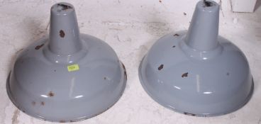 A large pair of Industrial grey and white enamel painted industrial pendant shades ( see