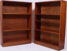 A pair of 1960's retro teak wood Air Ministry open window bookcase cabinets having shelved centres