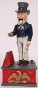 A vintage style cast metal novelty Uncle Sam money box
