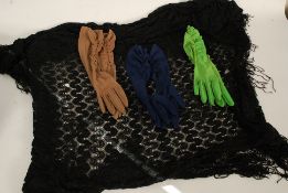 A decorative early 20th century black lacework shawl together with ladies evening gloves in various