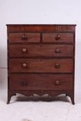 A Victorian mahogany chest of drawers raised on bracket feet with 2 short over 3 deep drawers each