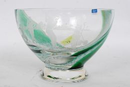 A large Caithness bowl engraved with a golfing design depicting golfers in swing,