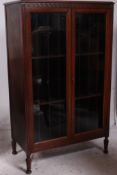 An Edwardian solid mahogany estate display filing office cabinet.