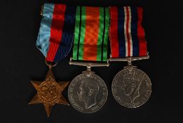A World War Two / medal group trio ( Defence Medal, 1939-1945 Medal & 1939-1945 Star) .