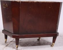 A Georgian style heavy mahogany lead lined cellerette / drink bucket having tapered supports with