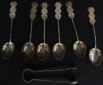 A collection of white metal Chinese tea spoons with character marked handles together with a pair