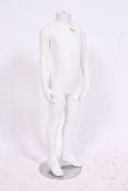 A 20th century contemporary childs torso mannequin - shop haberdashery display stand