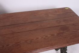 A  good early 20th century vintage cast metal rectangular  tavern table,