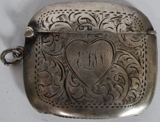 An Edwardian  silver vesta being hallmarked for Birmingham,