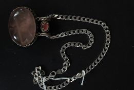 A large heavy chunky 925 white metal silver necklace, with large inset purple stone,