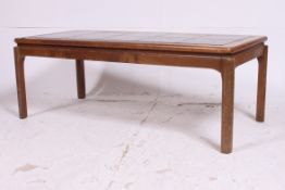 A retro tile top 1970's vintage coffee table  having inset tiles to centre ( see illustration )
