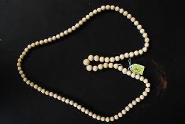 Early 20th century long graduated string of ivory beads