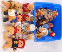 WINNIE THE POOH; A large collection of Disney Store Winnie The Pooh teddy bears / beanie bears.