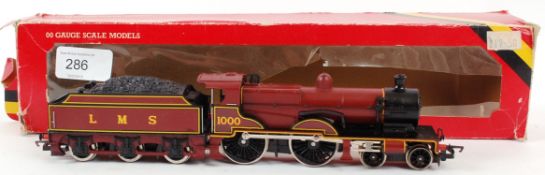 HORNBY; An original vintage Hornby 00 gauge R357 LMS 1000 railway trainset locomotive,