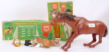 ANNA: A small collection of original 1970's ' Anna ' dolls and accessories.