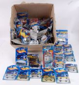 HOTWHEELS; A huge collection of assorted c2000 Mattel Hotwheels carded diecast model cars.
