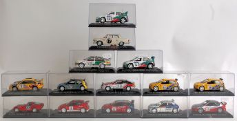 DIECAST; 14x 1:43 scale diecast model rally cars; Peugeot's, Renault, Skoda and others.