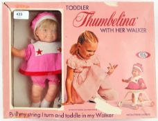 IDEAL THUMBELINA; An original vintage boxed Ideal Toddler Thumbelina doll and walker.