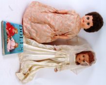 DOLLS; A vintage composition ' Bride ' doll, complete with wedding dress, veil and shoes,