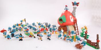 SMURFS; A large collection of original 1970's Peyo Smurfs figures, and accessories.