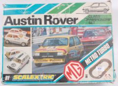 SCALEXTRIC; An original vintage Scalextric Austin Rover set, appears to be complete, with both cars,