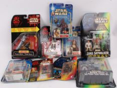 STAR WARS; A collection of assorted Star Wars carded unopened action figures,
