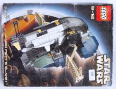 LEGO STAR WARS; An original boxed Lego Star Wars 7153 set - Jango Fett's Slave 1 ship.