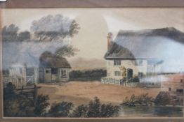 Water colour of cottages unmarked framed