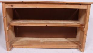 A contemporary open window bookcase  / b