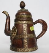 An Islamic copper and white metal coffee