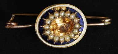 Gold brooch made from a necklace snap se