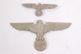 A collection of 2 Second World War Nazi third reich cap badges,