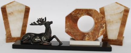A bronze style Stag mounted on a marble