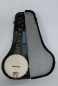 A British Made Banjo Mandolin having chrome rear complete with the case,